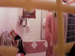 A spy webcam clip of my slender, horn-crazy lady using a towel to dry herself